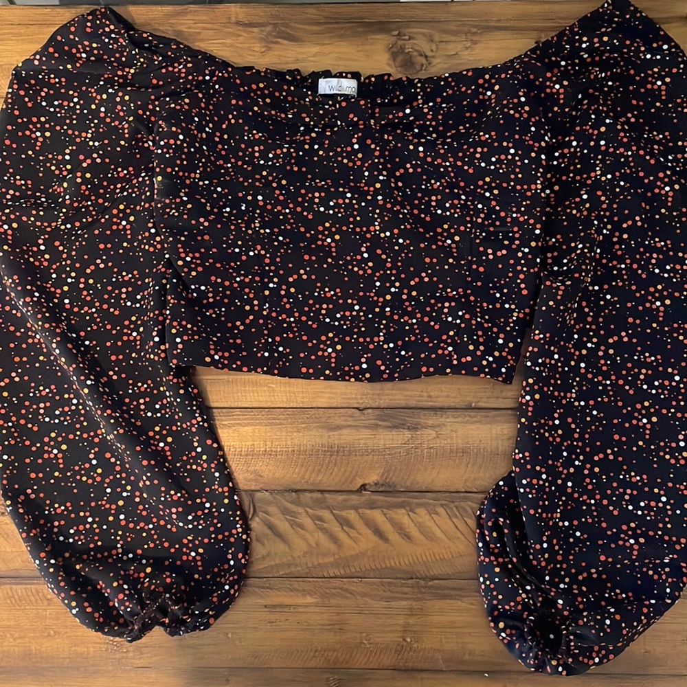 Black polka dot long sleeve blouse, can be off the shoulder.